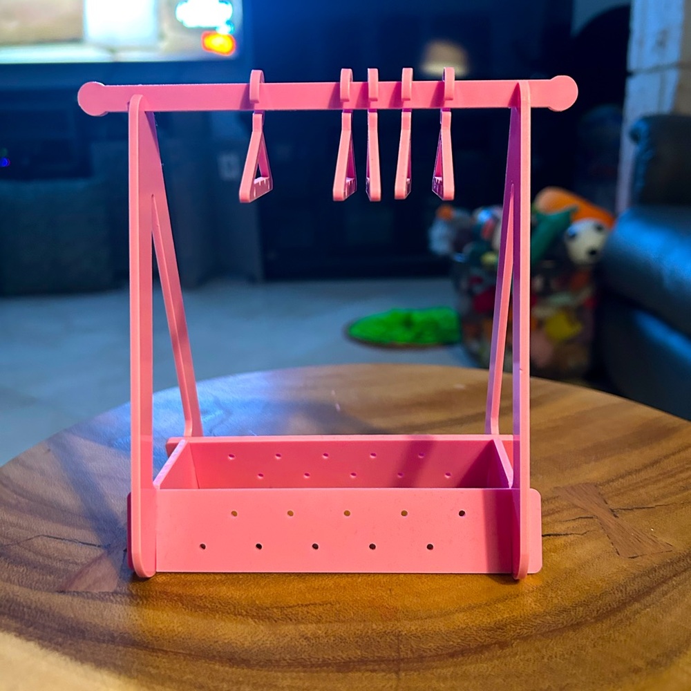 Pink acrylic jewelry display